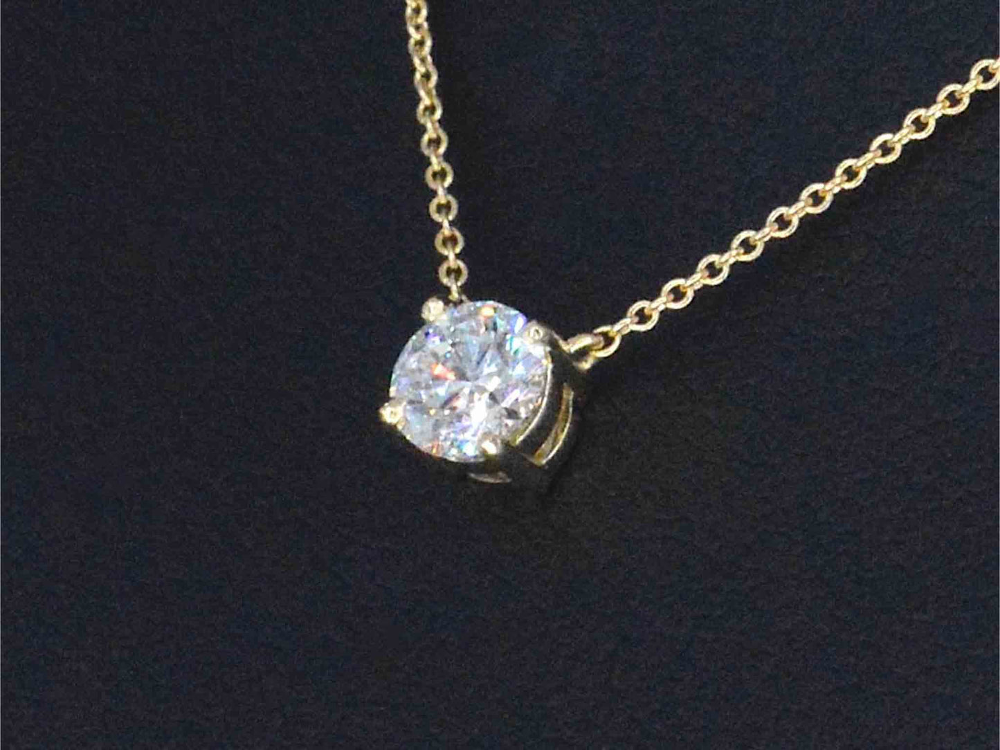 Gouden halsketting met een Briljant geslepen diamant van 0.50 carat