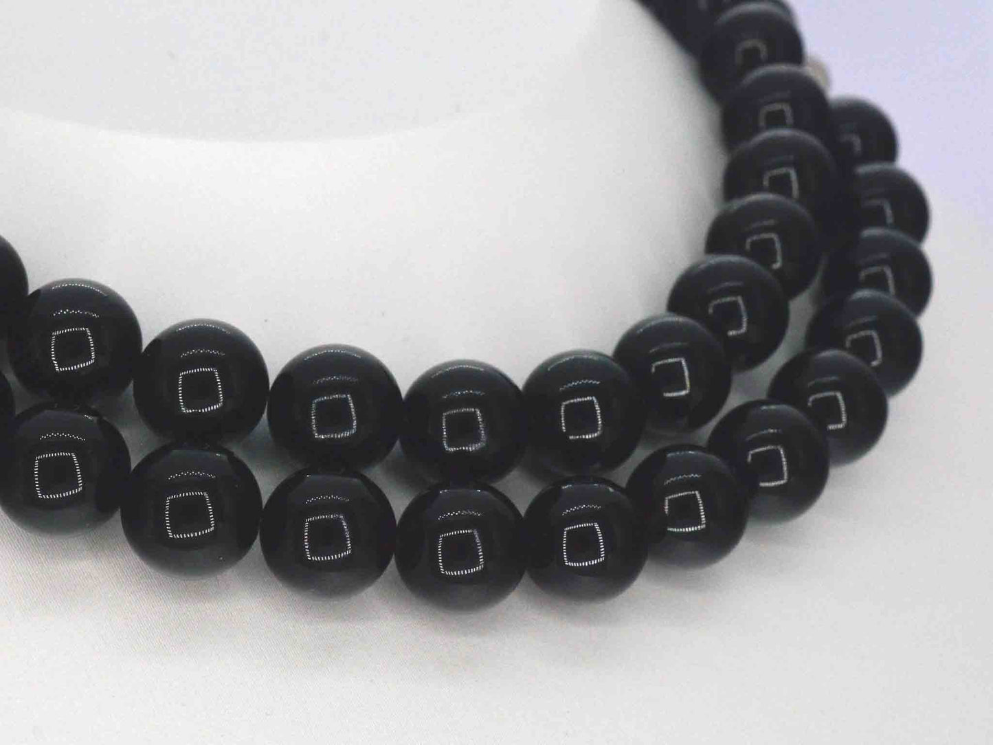 Halsketting met Onix edelsteen en een witgouden sluiting met diamant