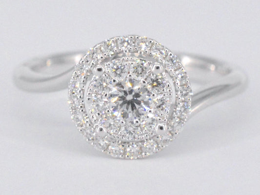 Witgouden entourage slagring met diamanten