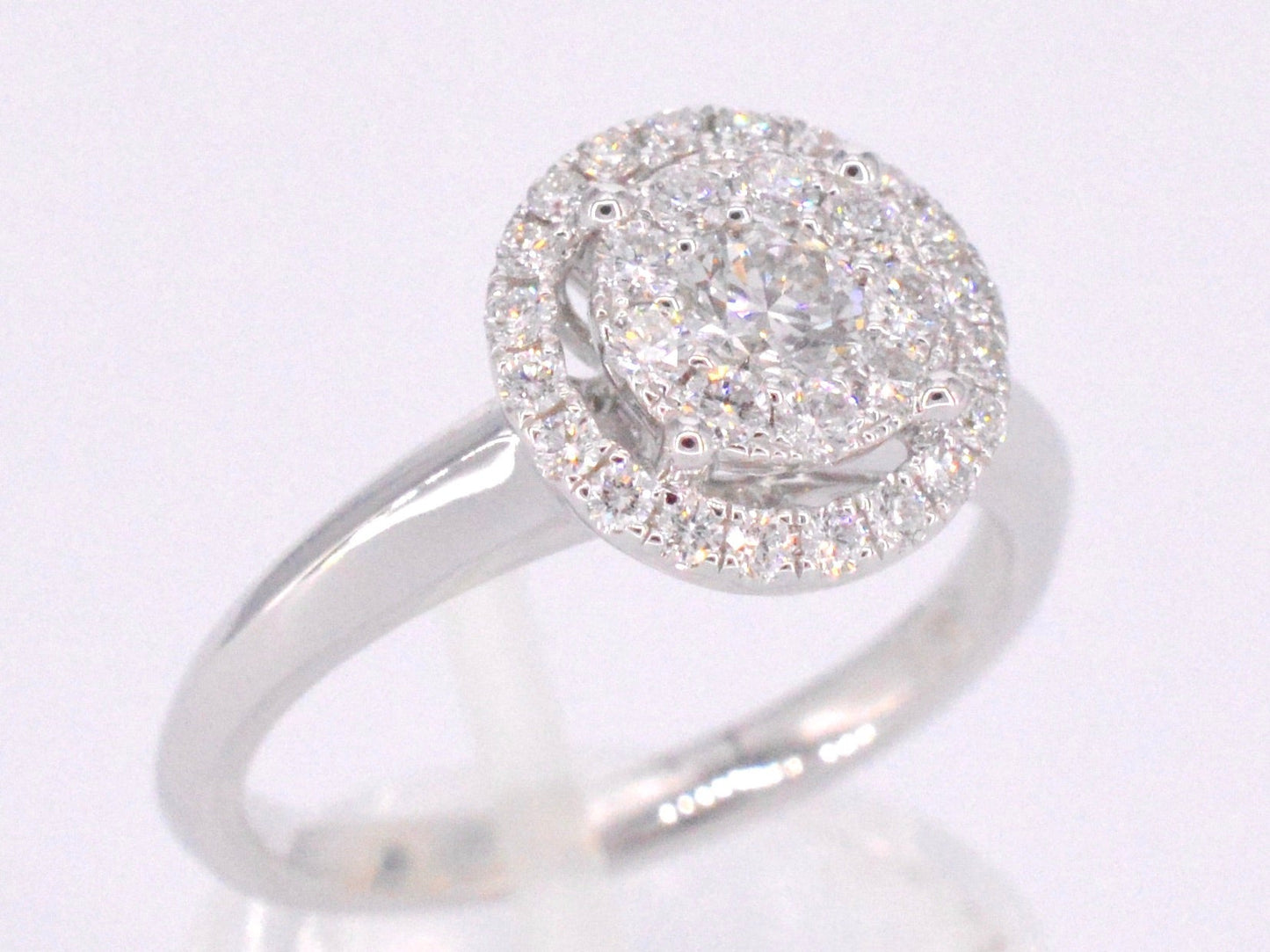 Witgouden entourage ring vol gezet met diamanten