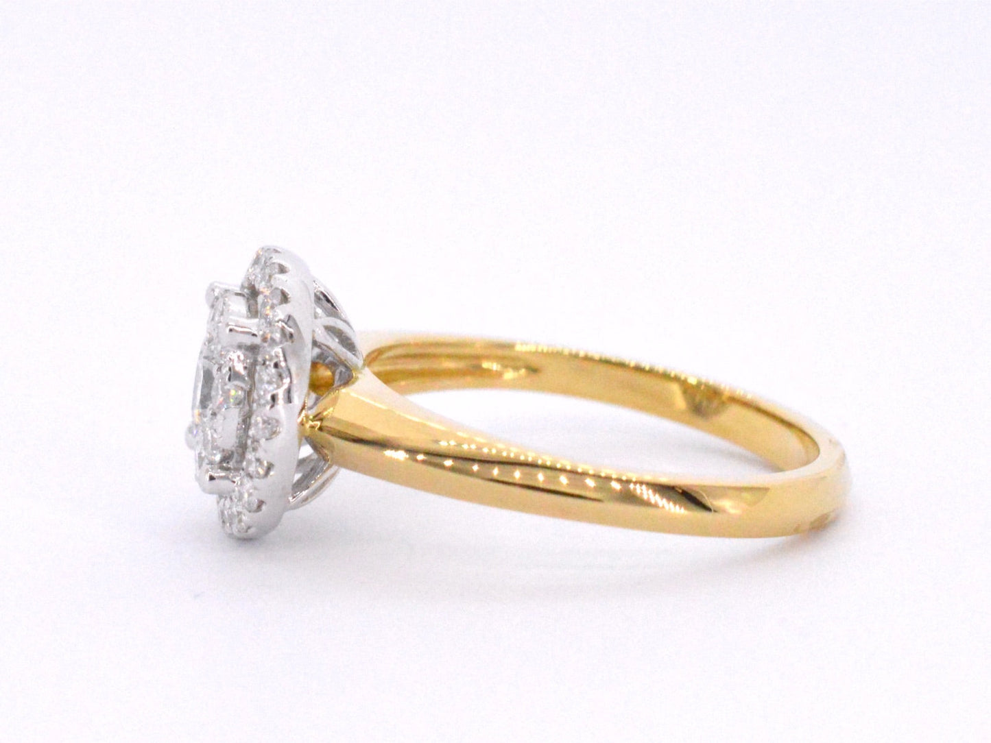 Gold entourage ring set with diamonds