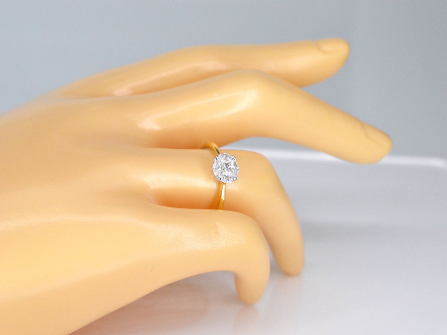 Gold ring with princess and marquise cut natural diamonds