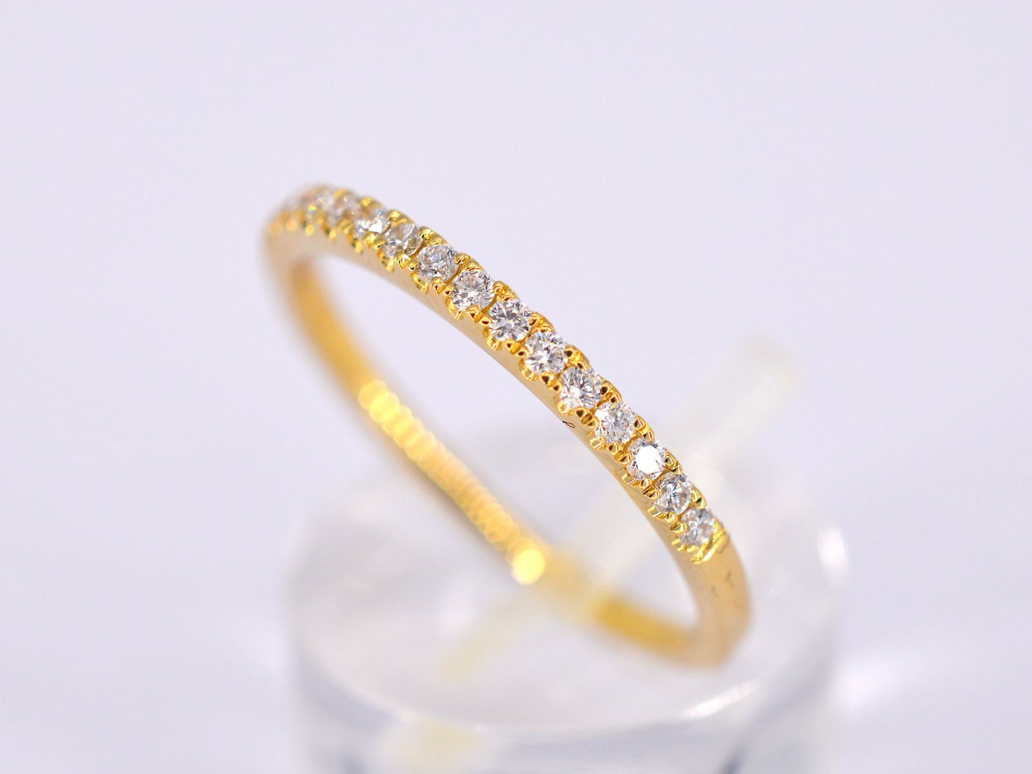 Gouden rijring met briljant geslepen diamant