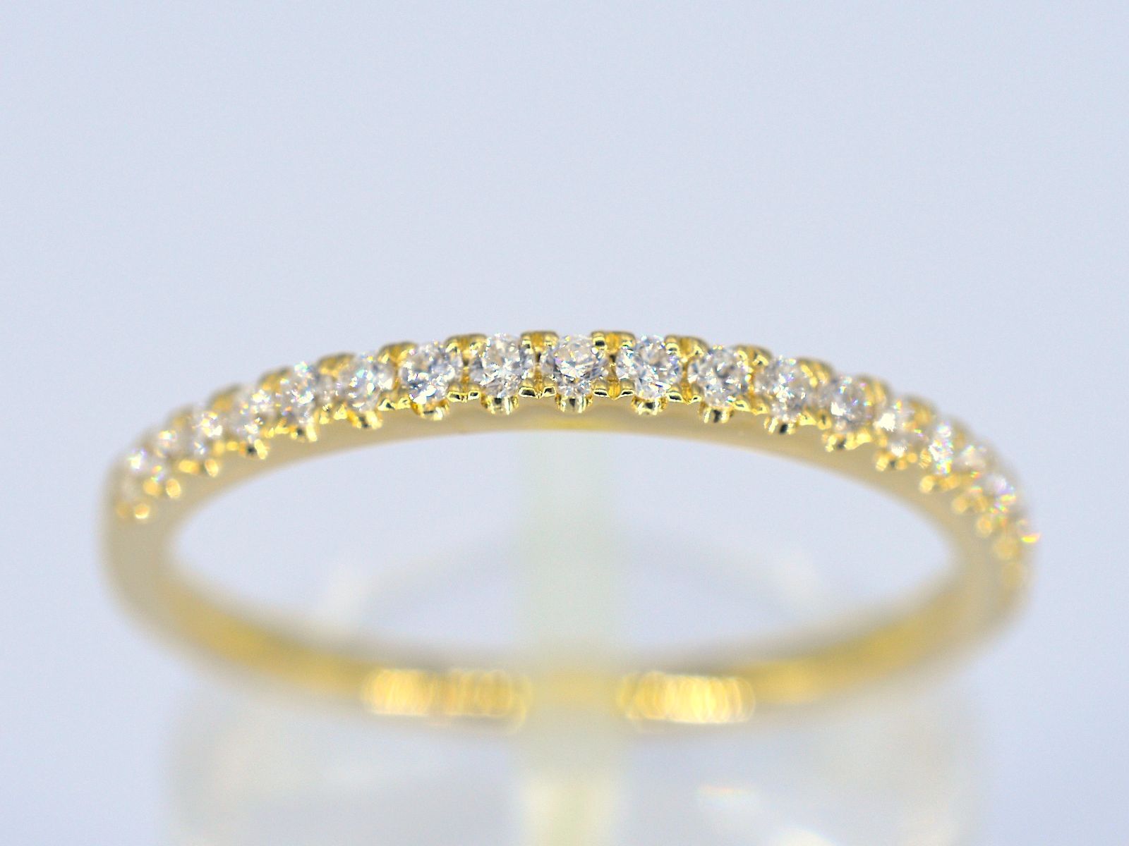 Gouden rijring met briljant geslepen diamant