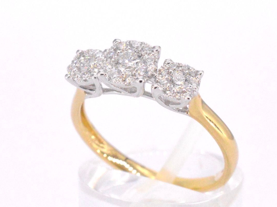 Gold ring with three diamond chatons 0.75 carat
