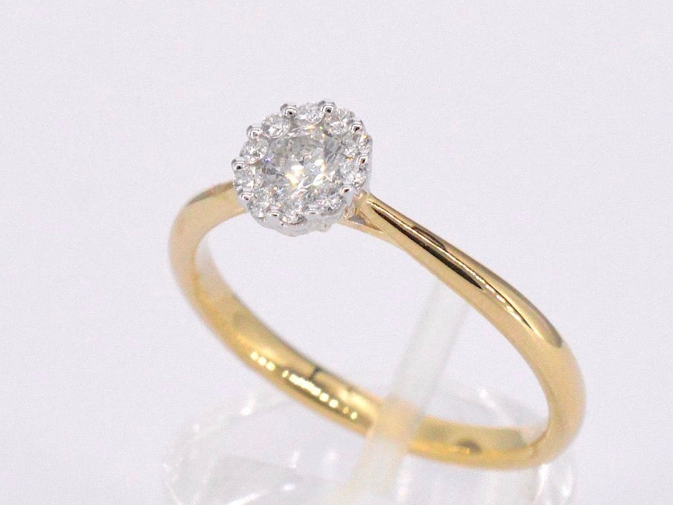 Gold ring with 0.35 carat diamond