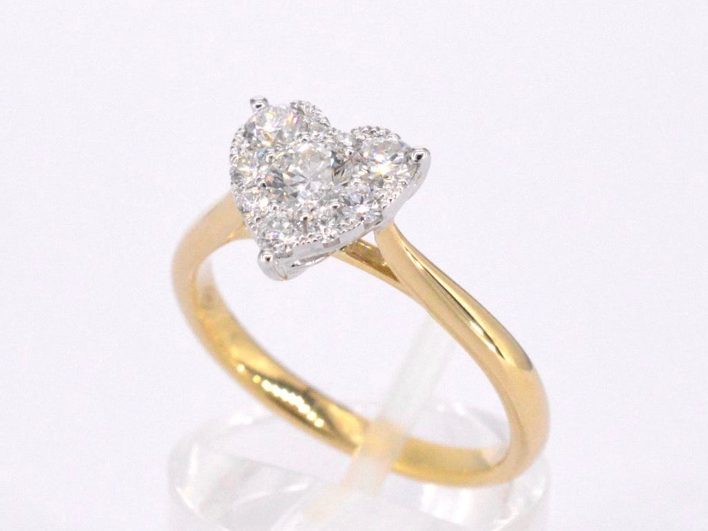 Gouden ring met diamanten in hart vorm