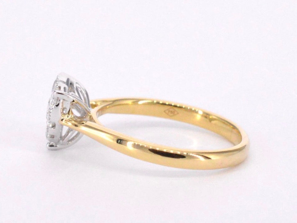 Gold ring with diamonds in heart shape