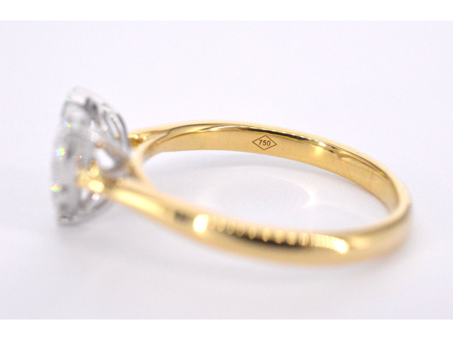 Gold ring with diamonds in heart shape