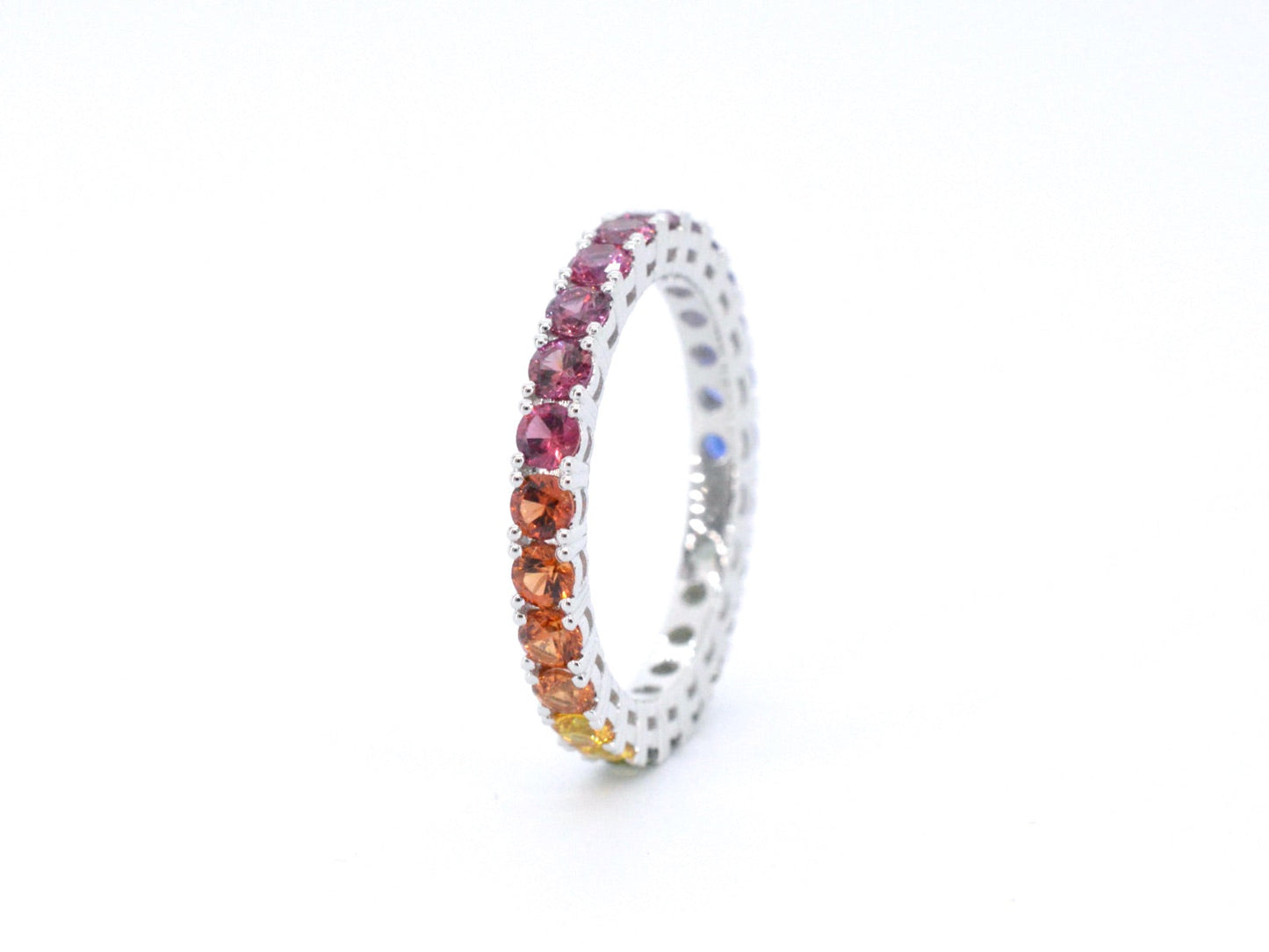 White gold ring with multicoloured sapphires