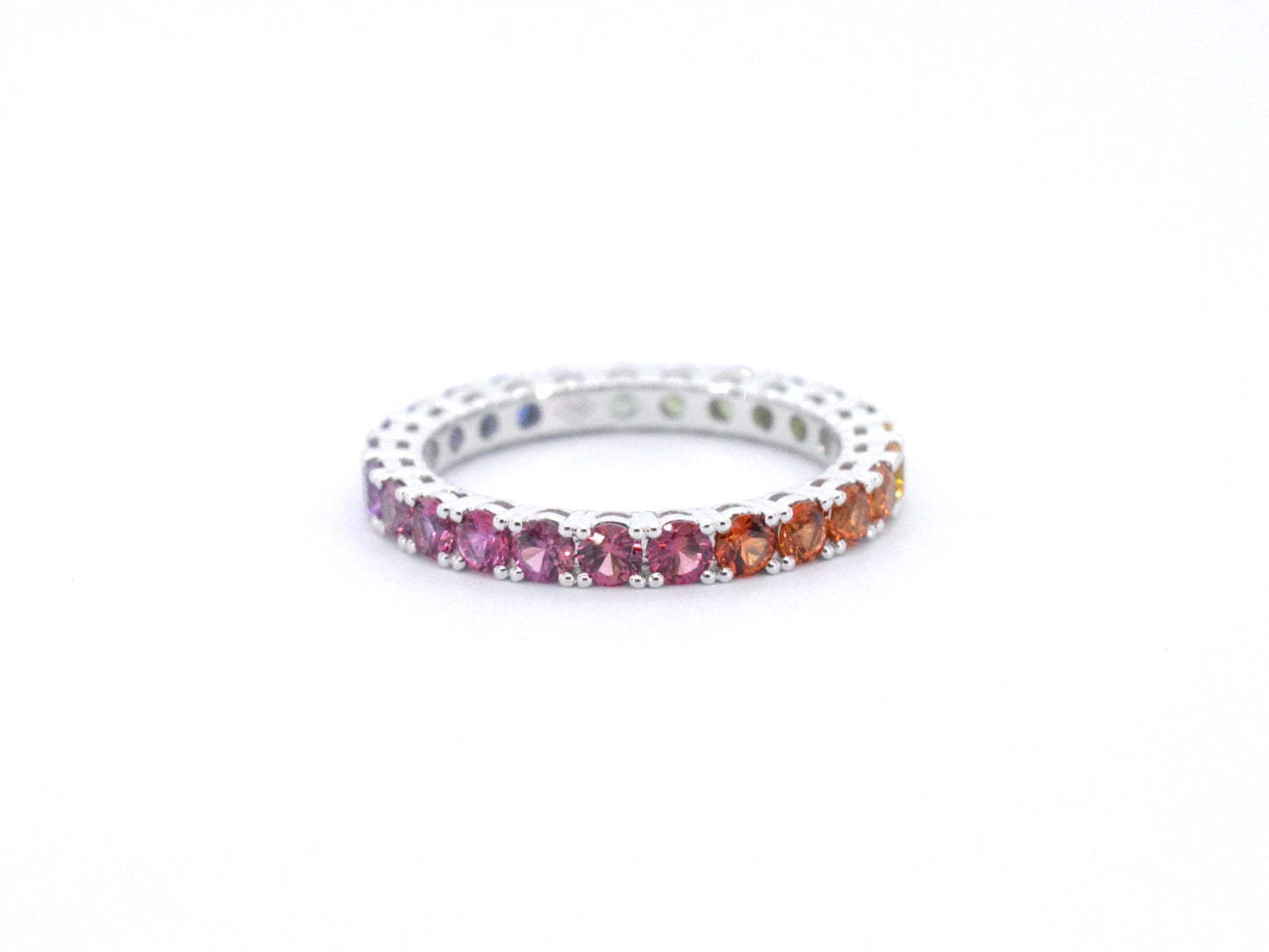 White gold ring with multicoloured sapphires