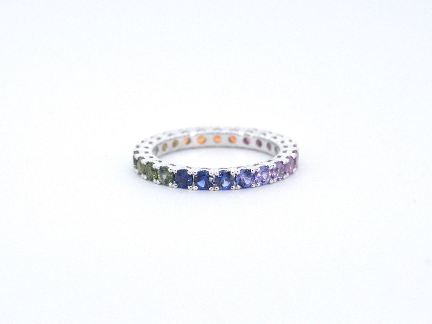 White gold ring with multicoloured sapphires