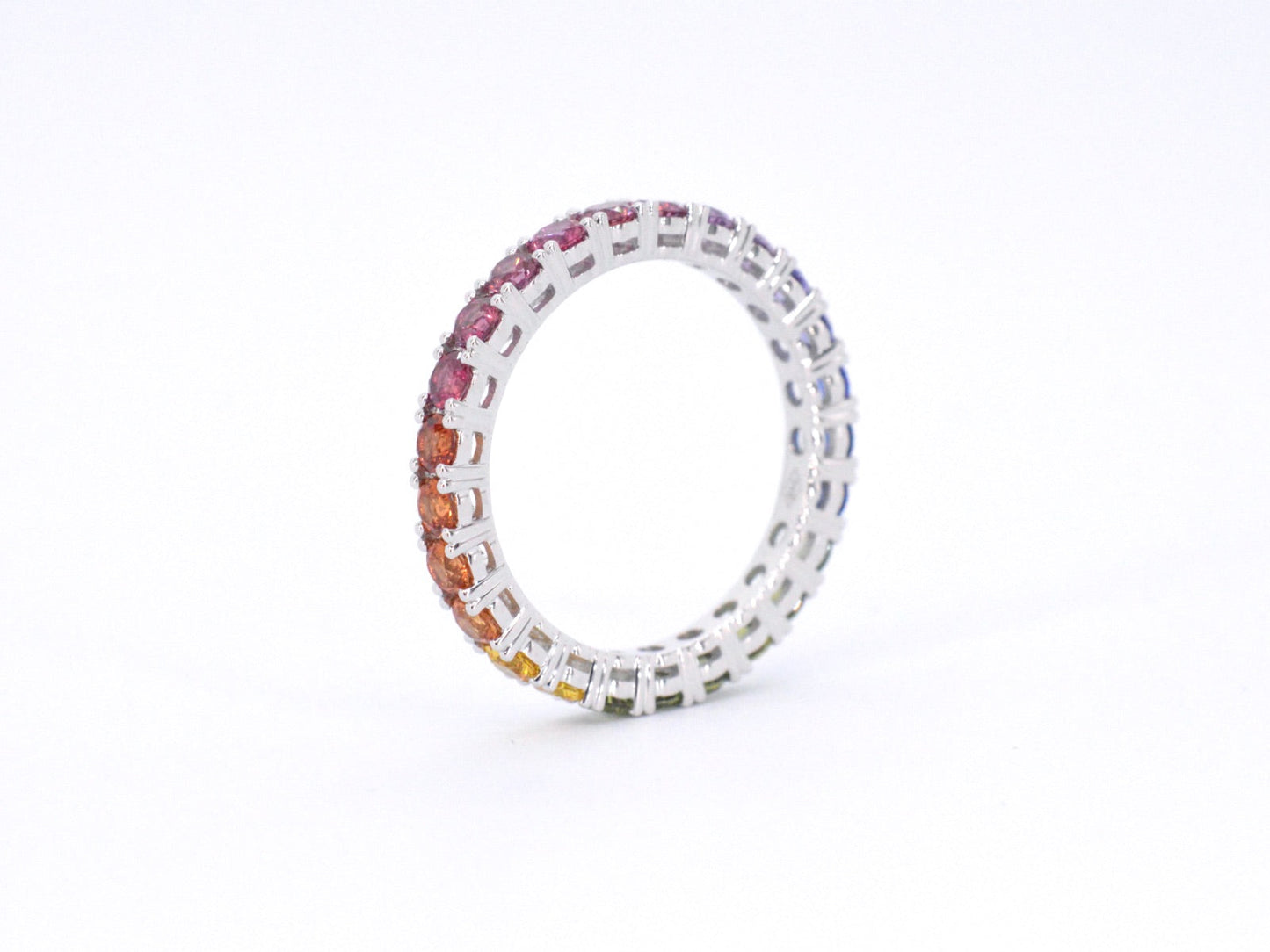 White gold ring with multicoloured sapphires