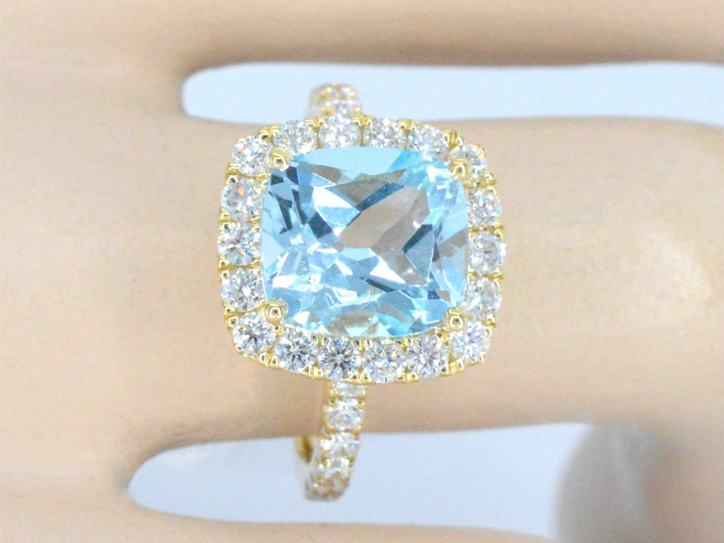 Gold entourage ring with natural topaz and diamonds