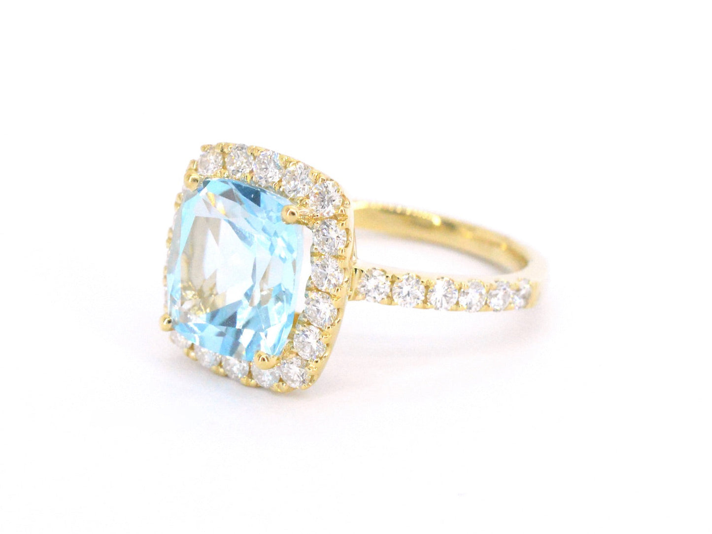 Gouden entourage ring met natuurlijke topaas en diamanten