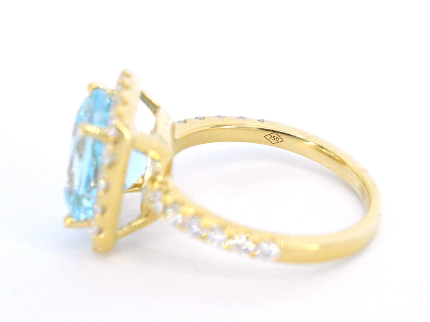 Gouden entourage ring met natuurlijke topaas en diamanten