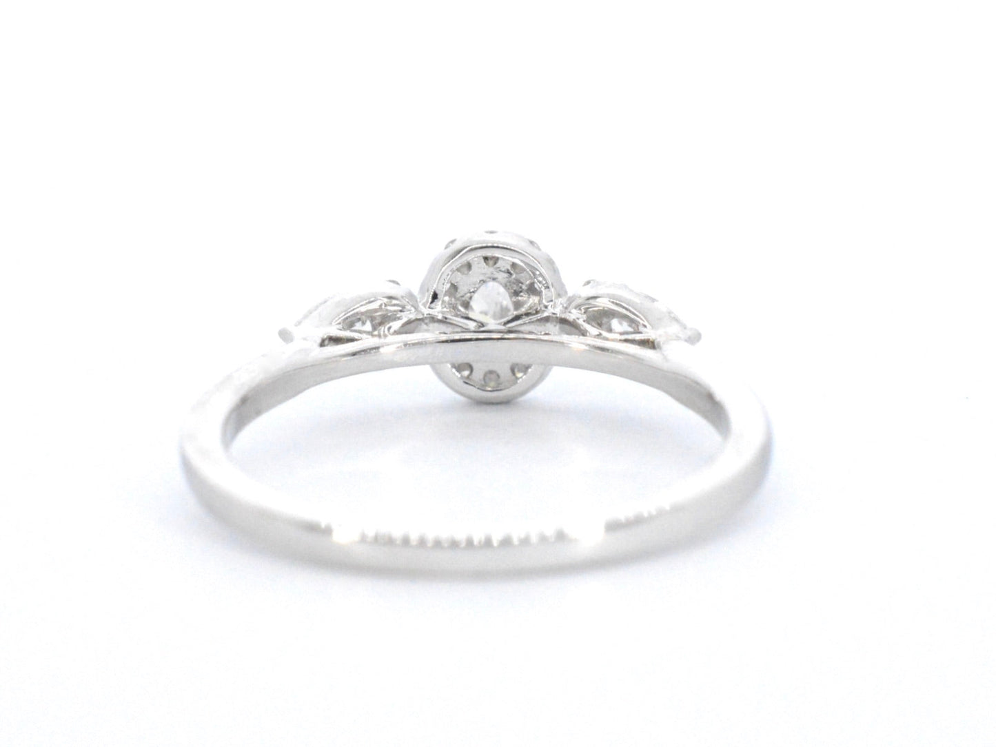 White gold ring with diamonds and an oval cut diamond