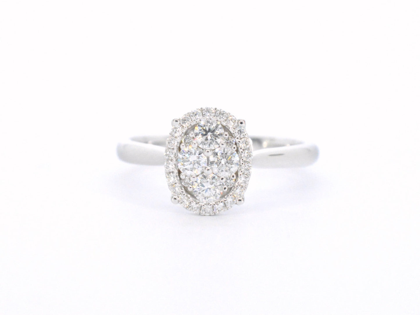 White gold ring with diamonds in oval shape