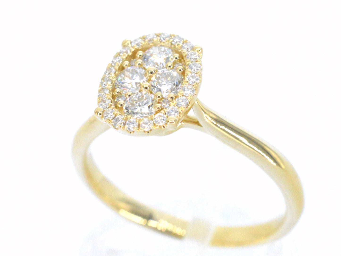 Gold ring with diamonds in oval shape