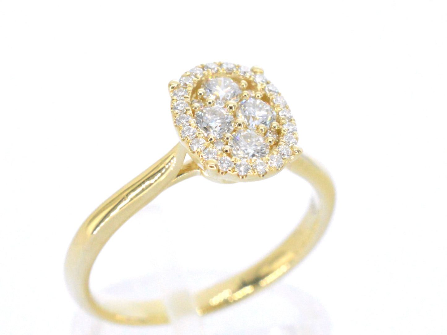 Gold ring with diamonds in oval shape