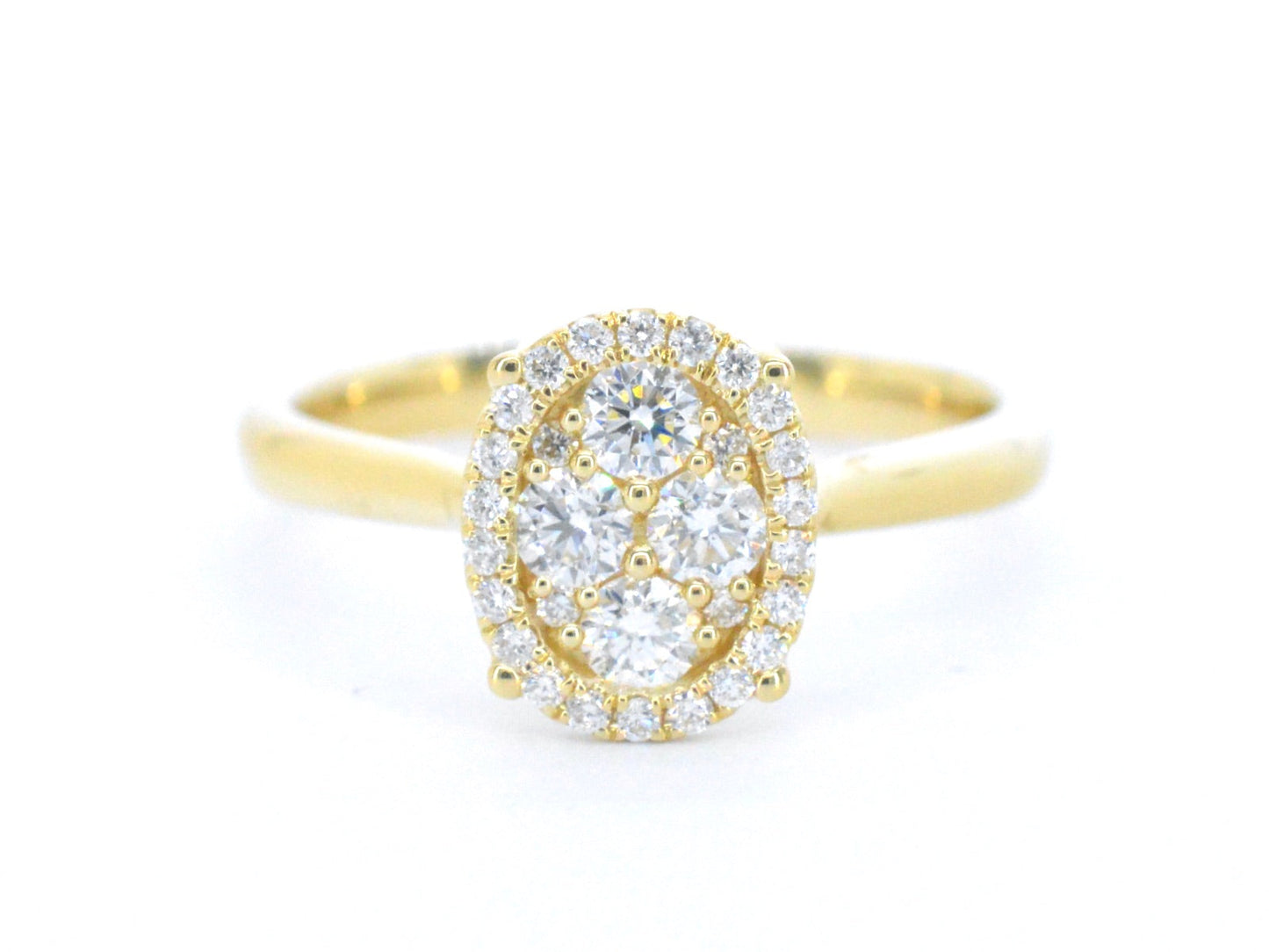 Gold ring with diamonds in oval shape