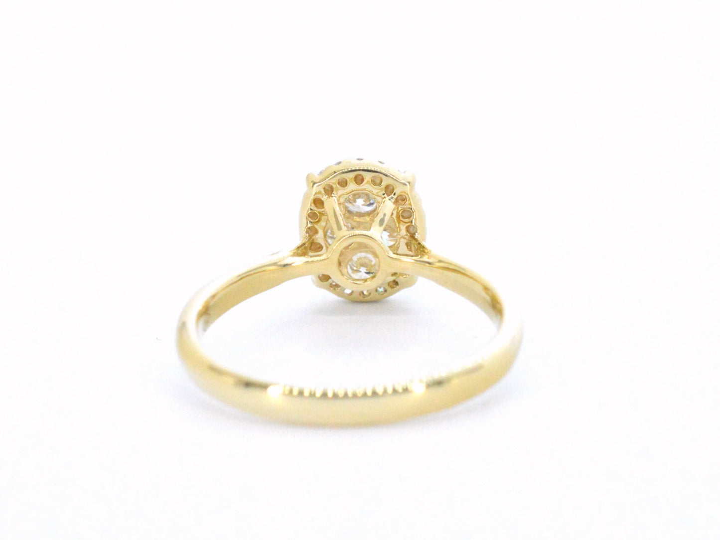 Gold ring with diamonds in oval shape