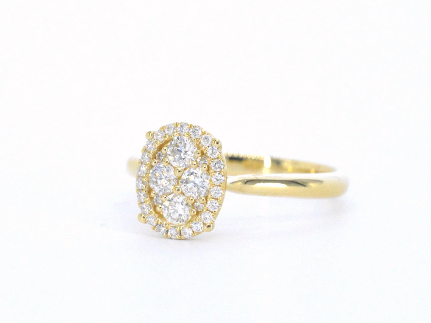 Gold ring with diamonds in oval shape