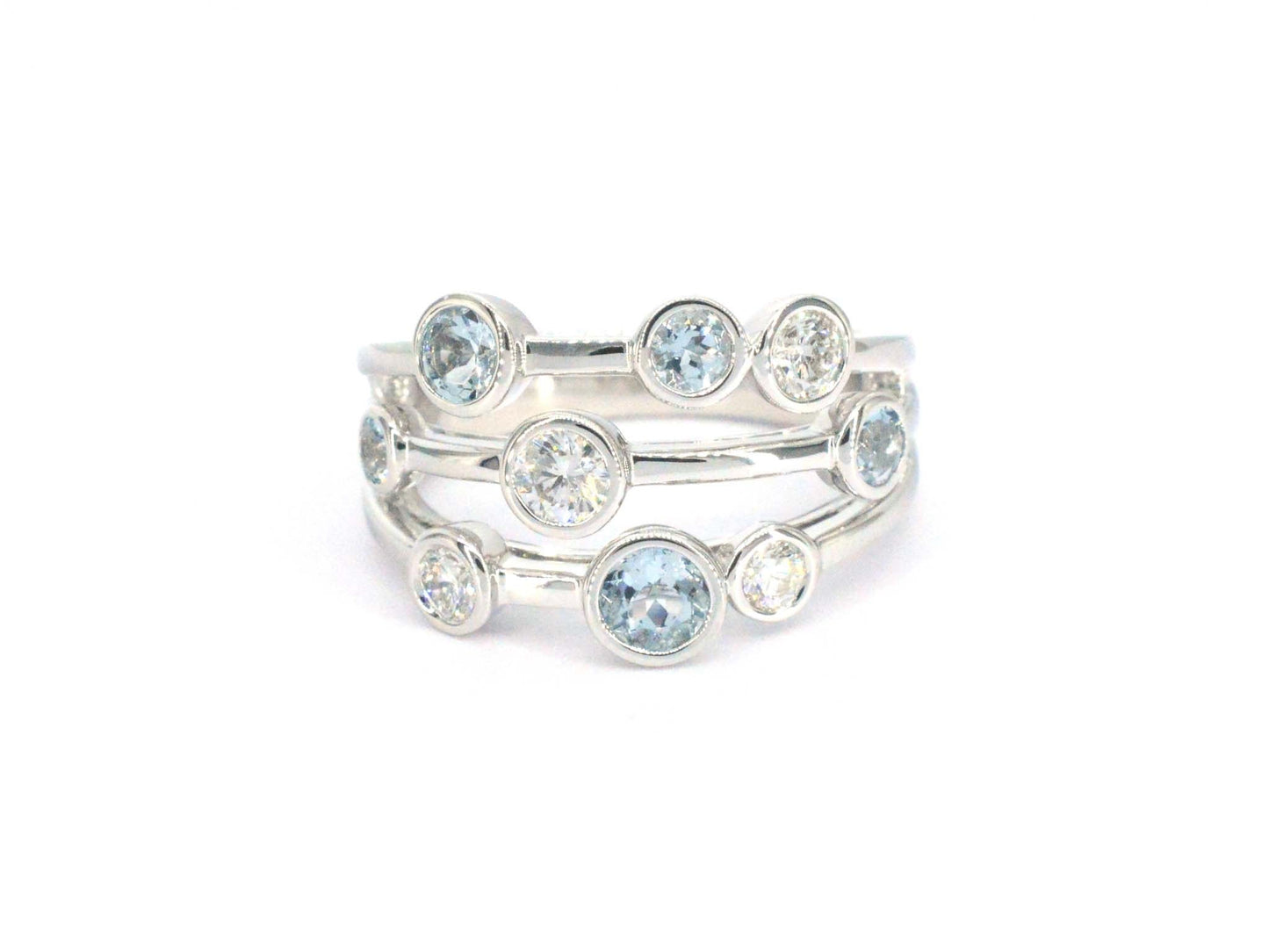 White gold design ring with aquamarine and diamond