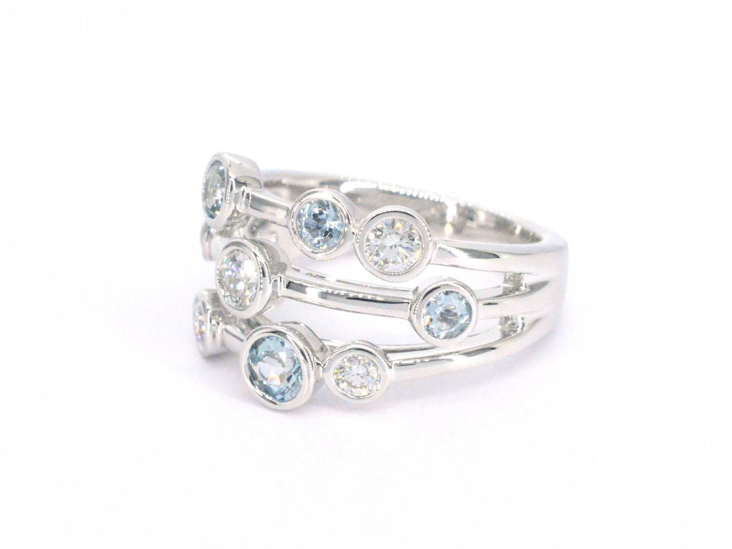 White gold design ring with aquamarine and diamond