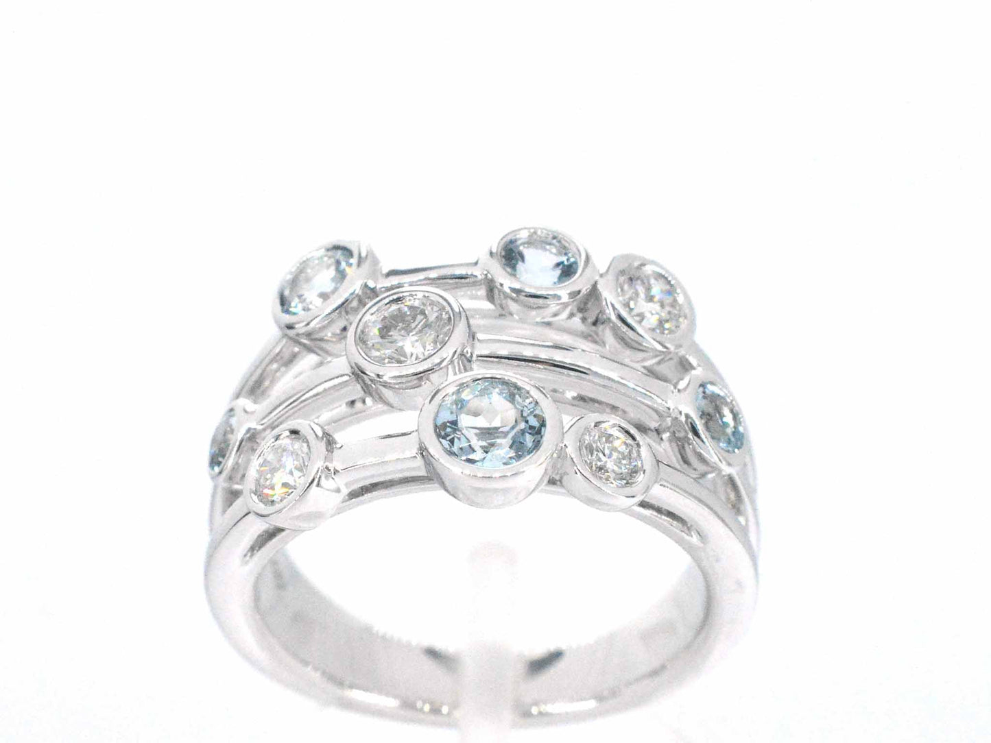 Witgouden design ring met aquamarijn en diamant