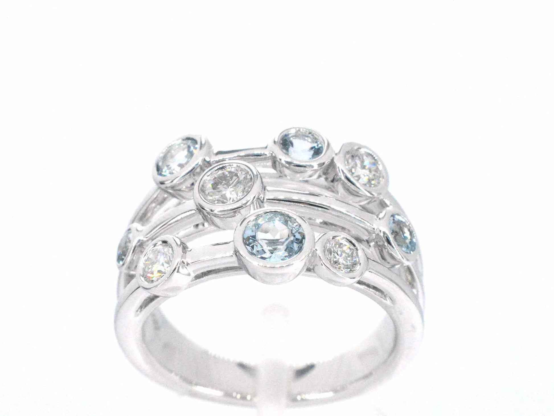 Witgouden design ring met aquamarijn en diamant