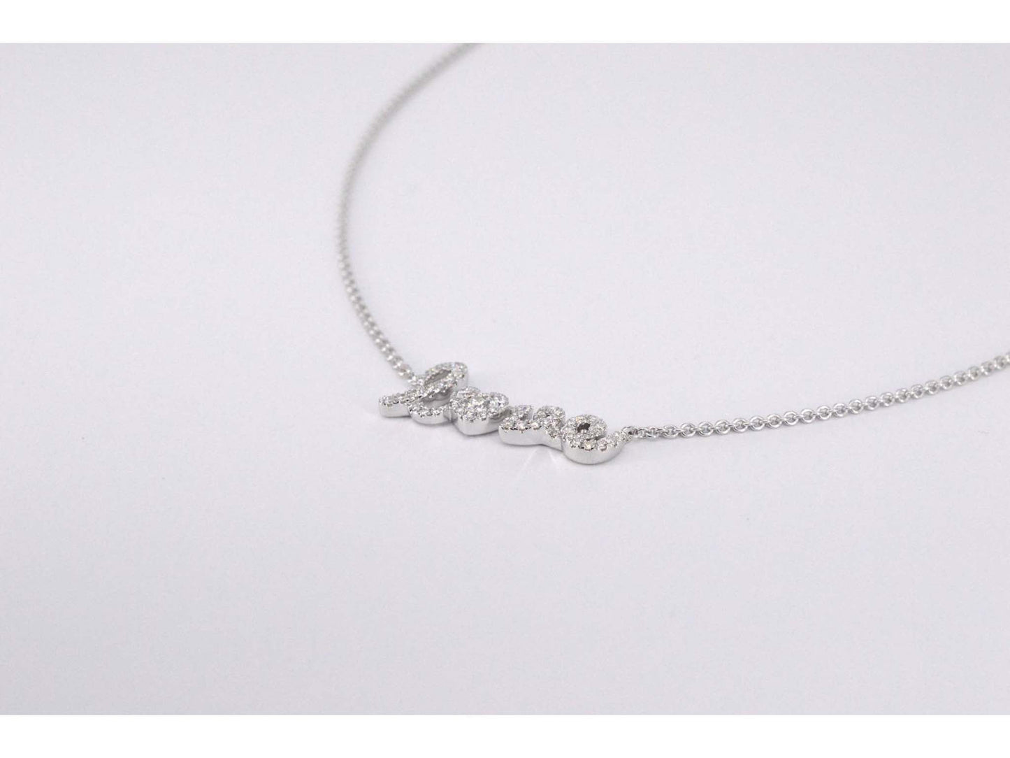 White gold 'love' necklace with diamonds