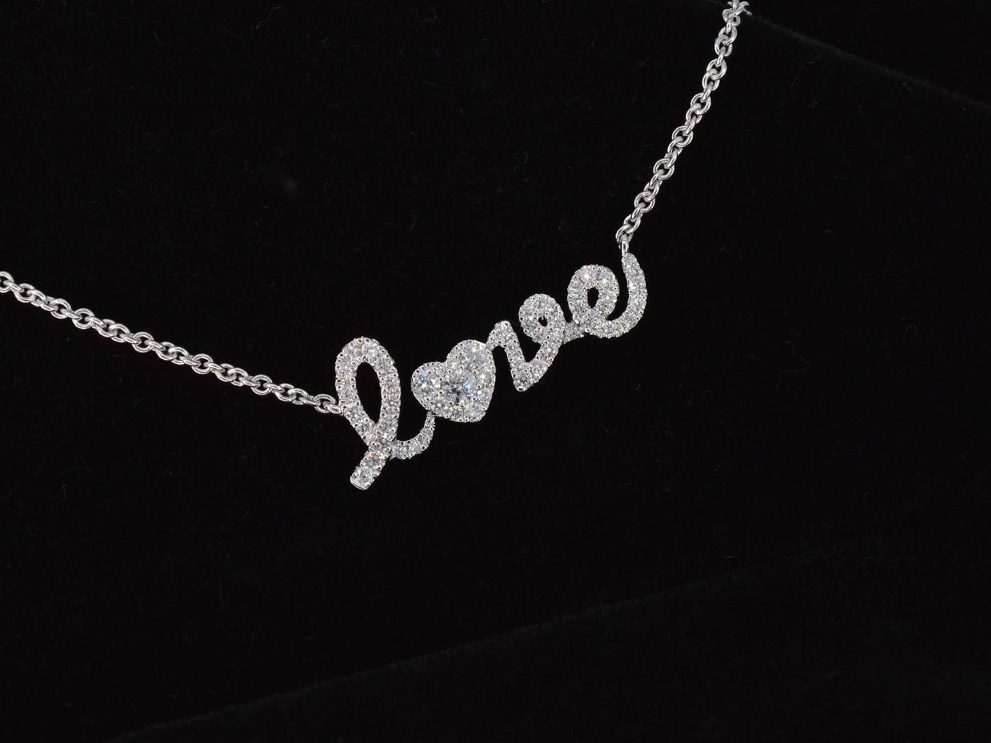 White gold 'love' necklace with diamonds