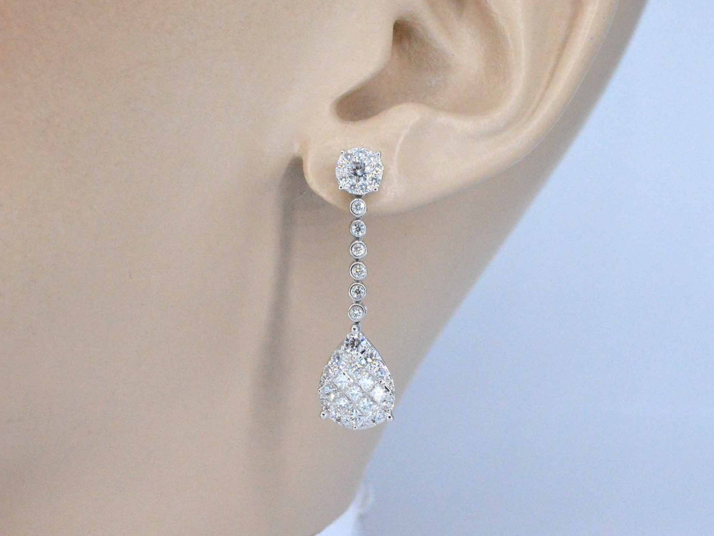 Druppelvormige oorhangers met briljant en princess geslepen diamanten