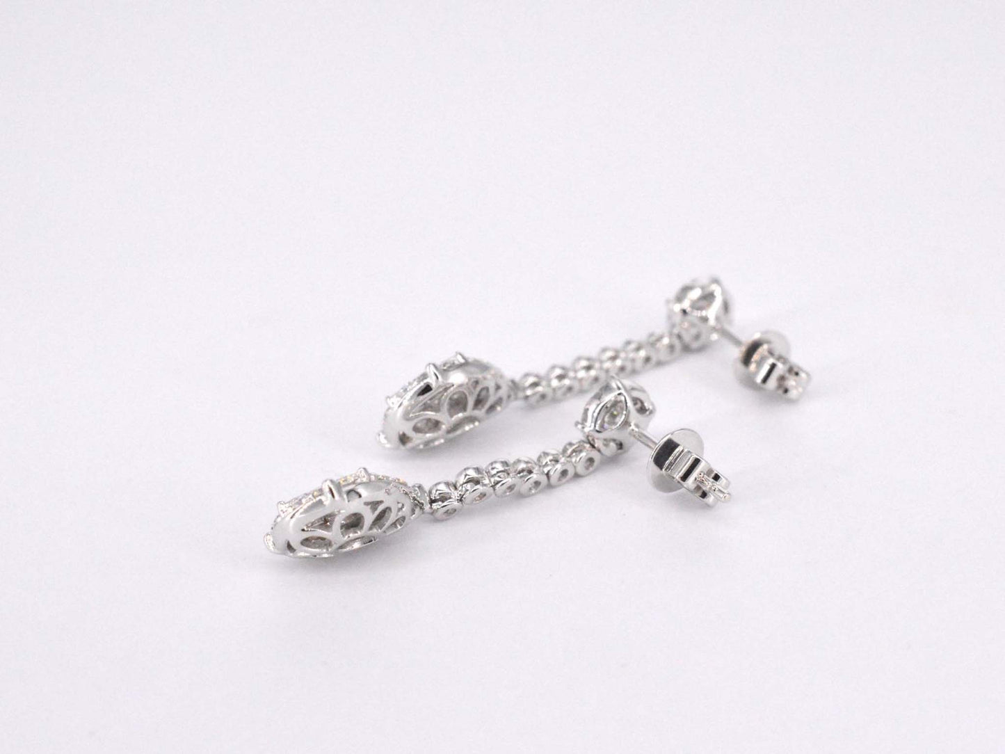 Druppelvormige oorhangers met briljant en princess geslepen diamanten