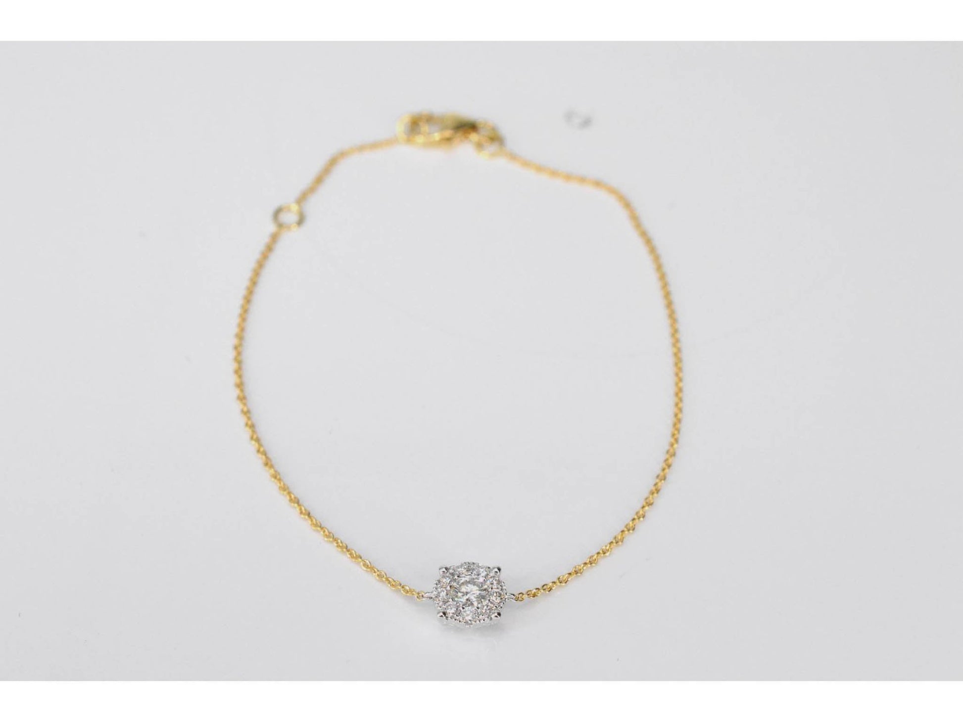 Gouden armband met een diamanten bedel
