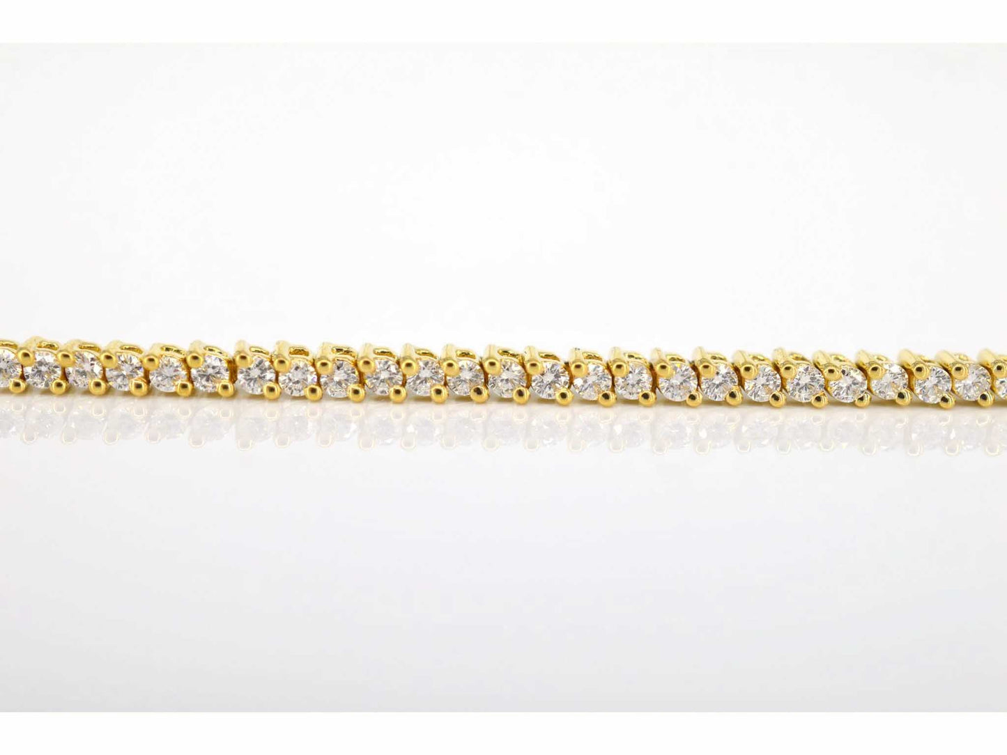 Yellow gold tennis bracelet with 1.50 carat diamonds