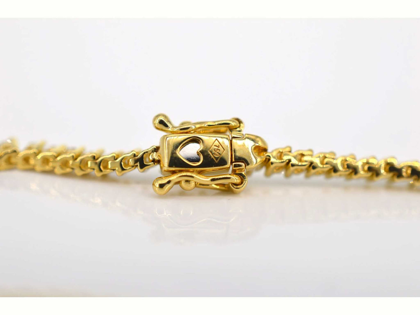 Yellow gold tennis bracelet with 1.50 carat diamonds