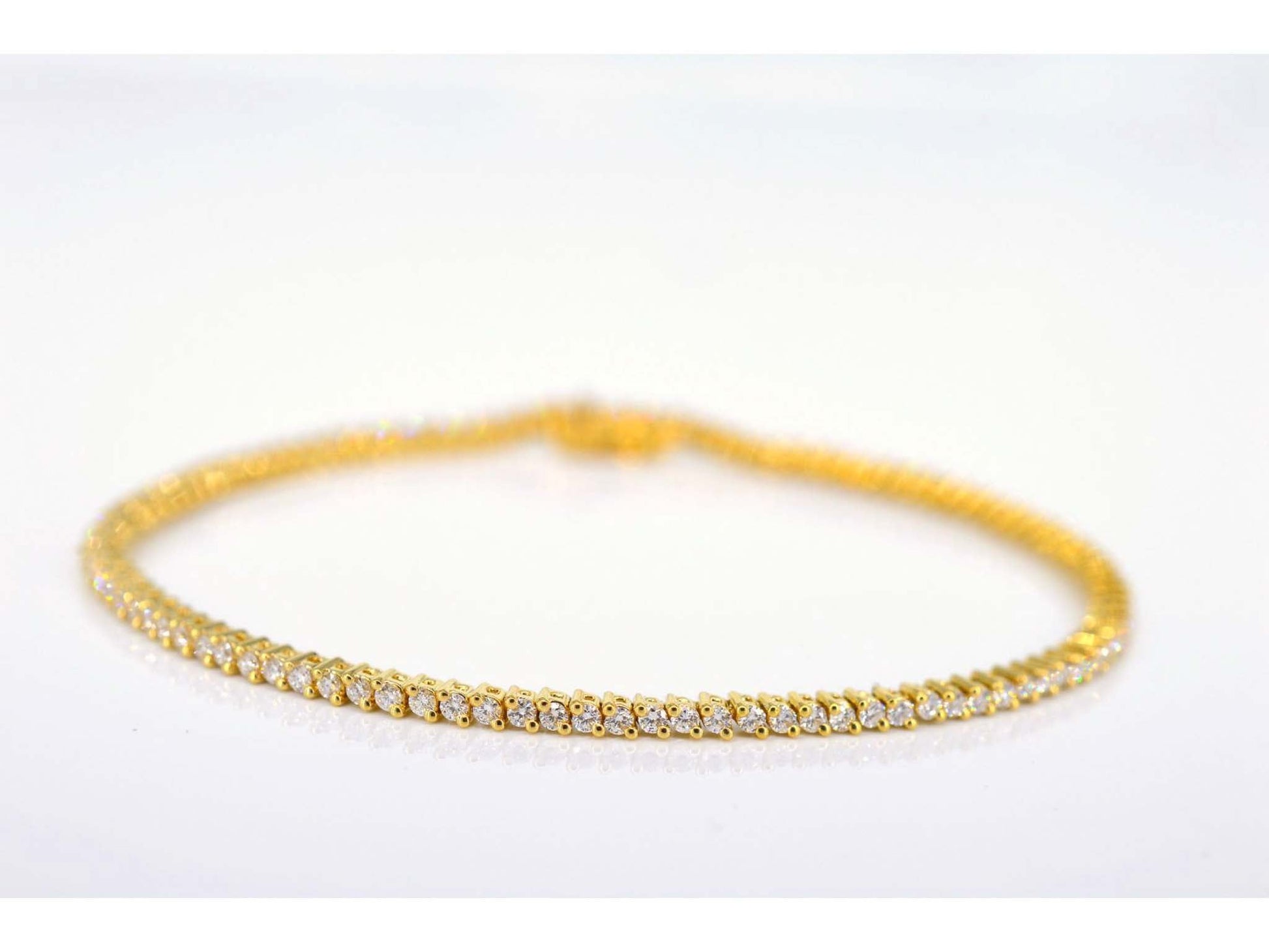 Geelgouden tennisarmband met 1.50 carat diamanten