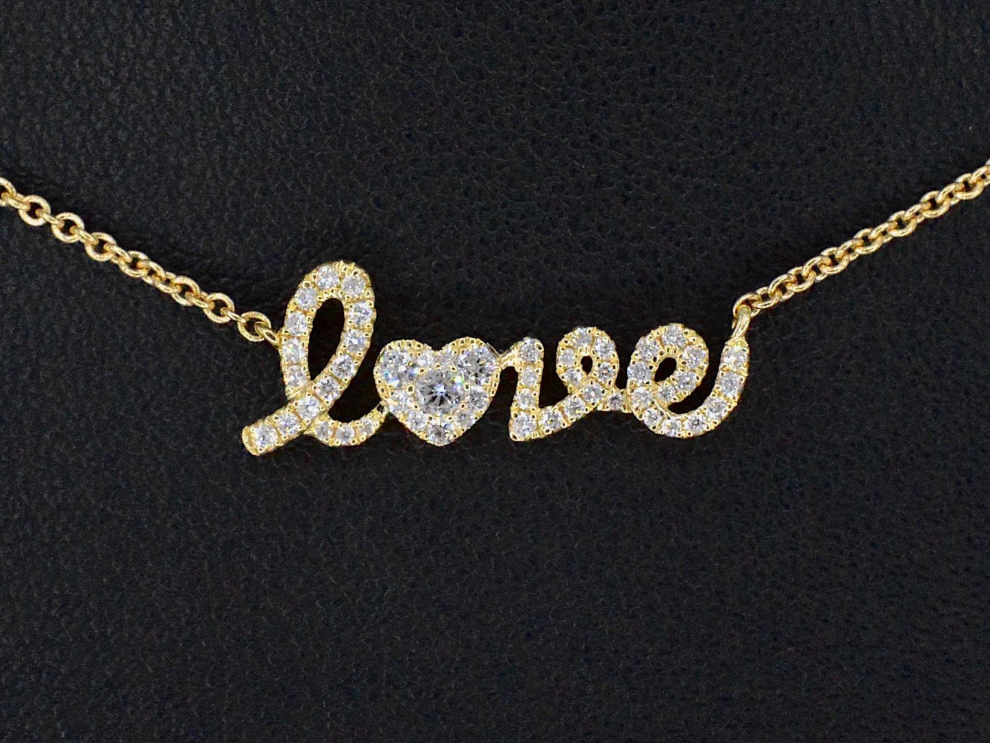 Gouden 'love' collier met diamanten