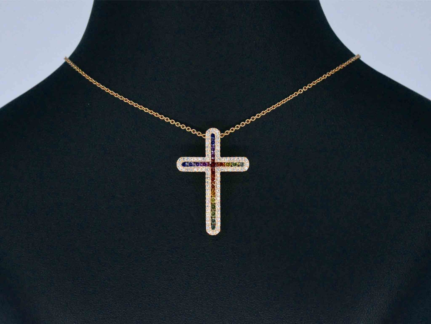 Gouden kruishanger met diamanten en edelstenen