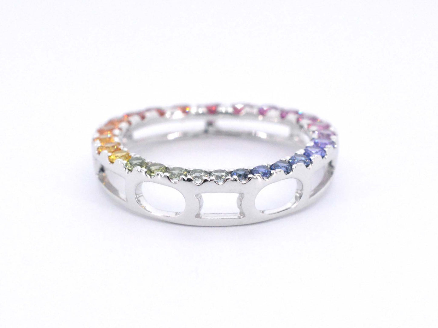 White gold pendant with multi-coloured sapphires set in a circle