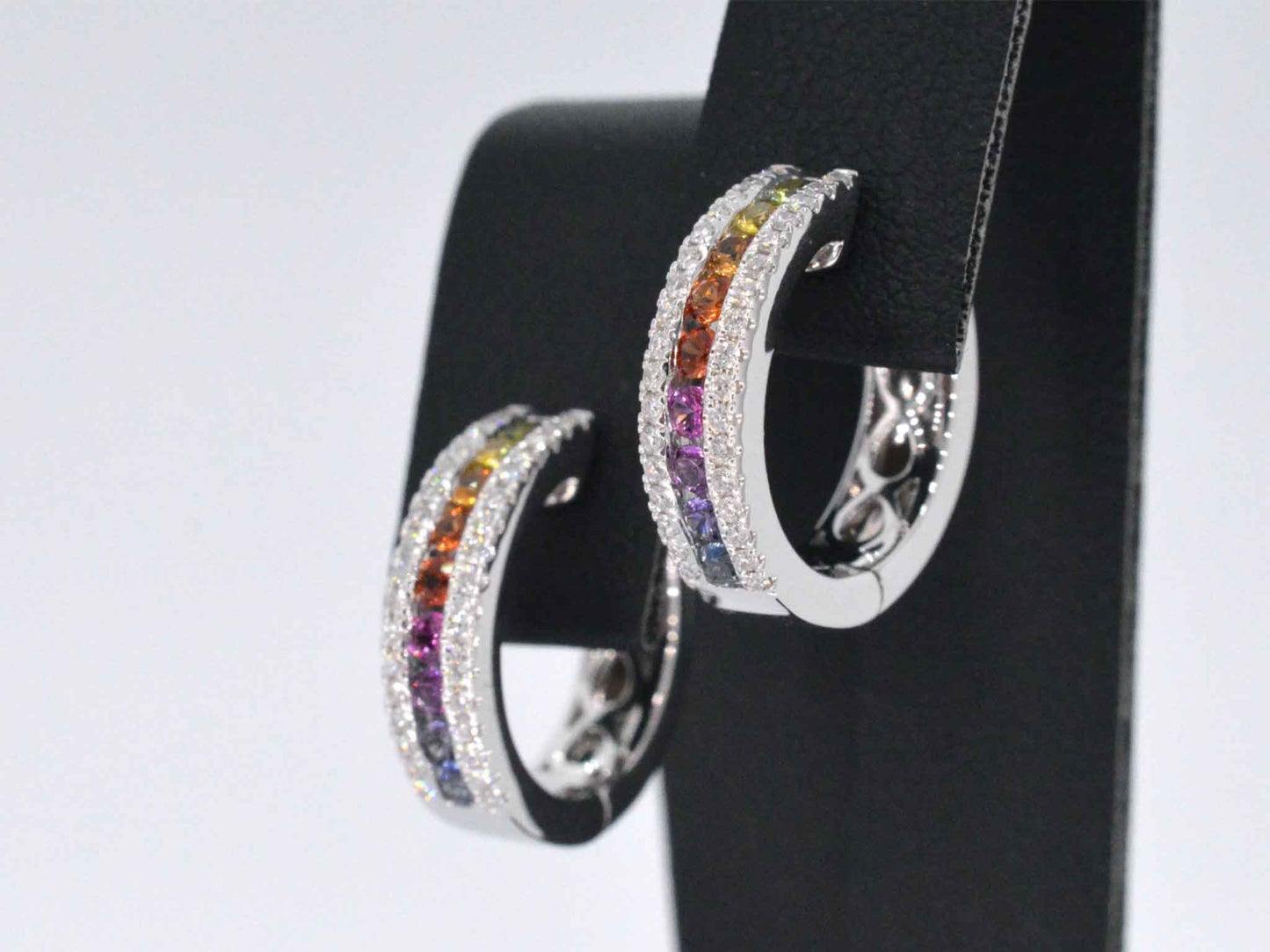 White gold earrings with multi-colored sapphires and diamonds