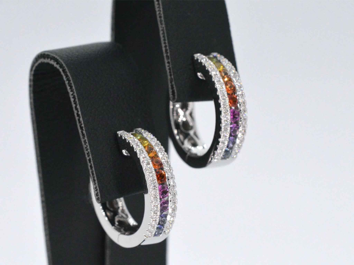 White gold earrings with multi-colored sapphires and diamonds