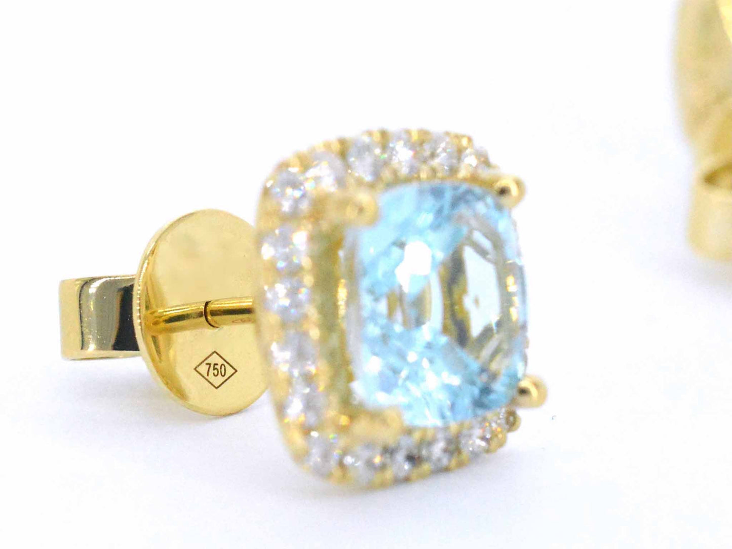 Gouden entourage oorbellen met grote topazen en diamanten