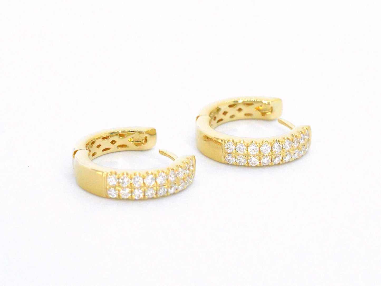 Gold hoop earrings with two rows of diamonds