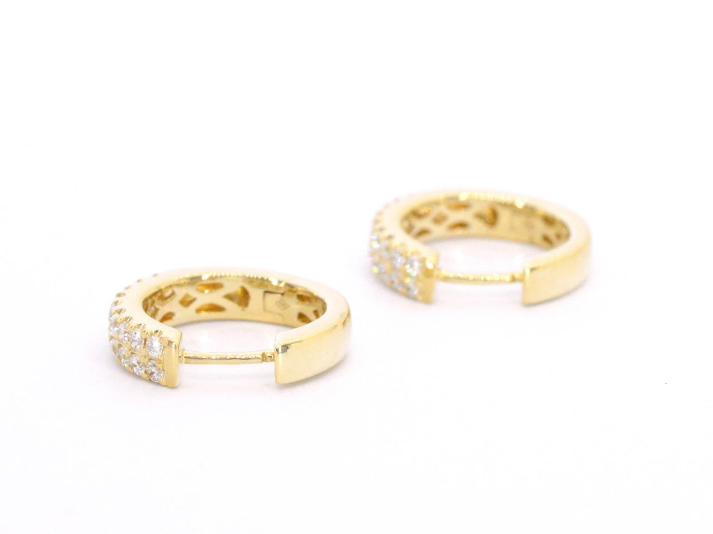 Gold hoop earrings with two rows of diamonds
