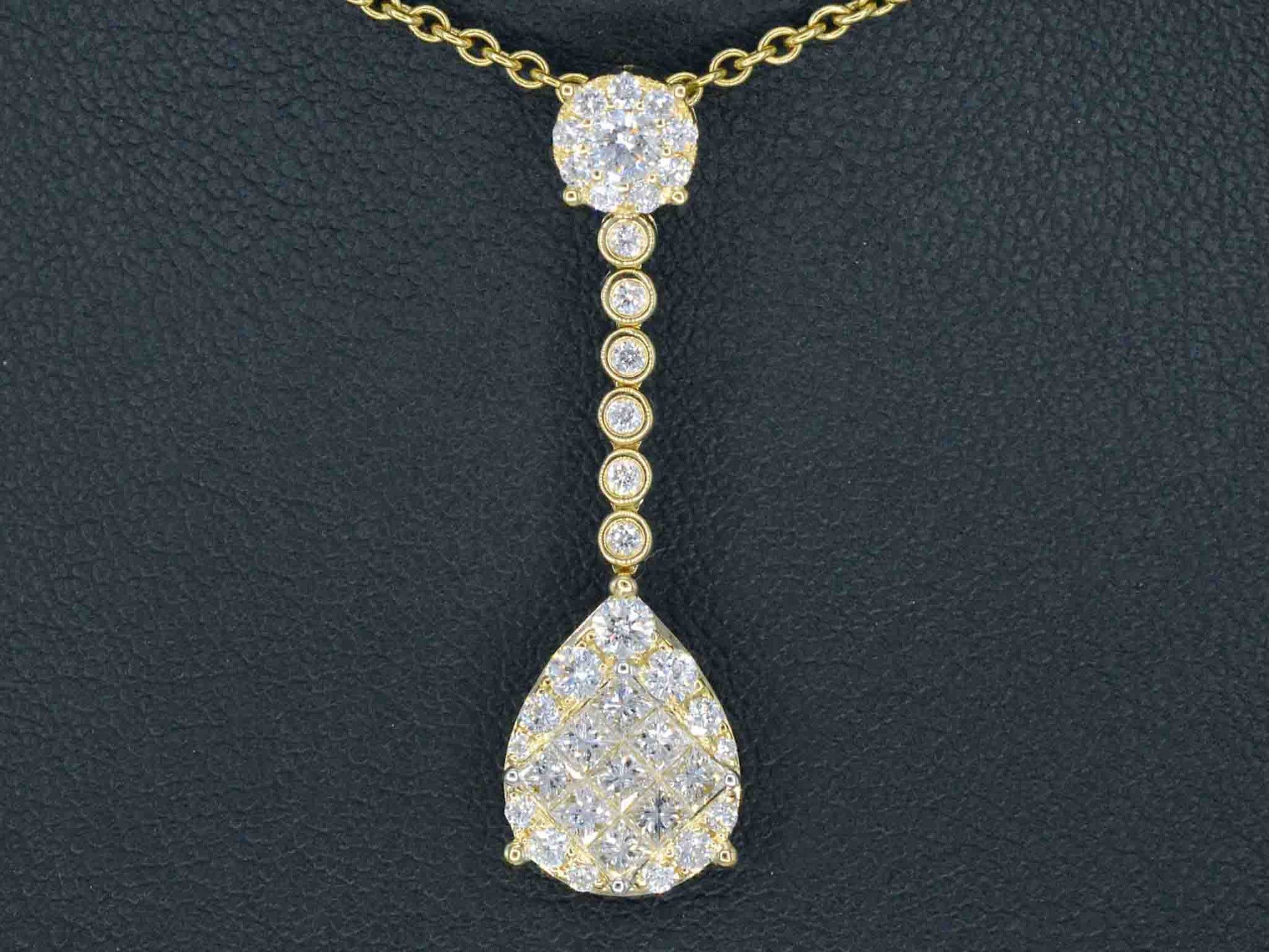 Gouden druppelvormige hanger met briljant en princess geslepen diamanten