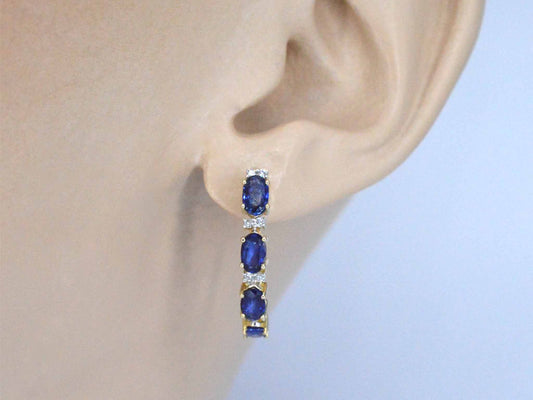 Gouden oorbellen met diamanten en saffier