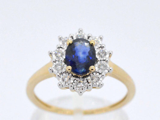 Gouden entourage ring met saffier en briljanten
